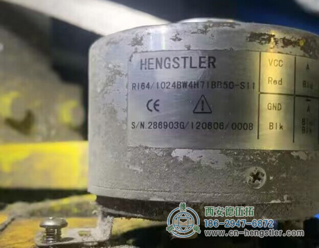 圖為一只用了很久的亨士樂RI64系列光電增量編碼器 圖為一只用了很久的亨士樂RI64系列光電增量編碼器